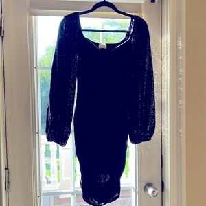 Fitted black  dress with sequinned long sleeve